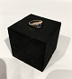 Small ring in 
14 ct. gold 
with simpel 
blue stone, 
stamped KJa.
Size - 45.