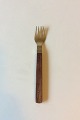 Almue Cohr 
Brass and Wood, 
Dinner Fork. 
Measures 19,2 
cm / 7 1/2"
