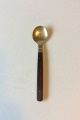 Almue Cohr 
Brass and Wood, 
Dinner Spoon. 
Measures 19.3 
cm / 7 1/2"
