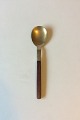 Almue Cohr 
Brass and Wood, 
Serving Spoon. 
Measures 23.2 
cm / 9 1/4"