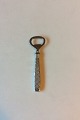 Stjerne, Jens 
Harald 
Quistgaard 
silver plate 
Bottle Opener. 
Measures 12.6 
cm / 4 61/64"