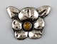 Danish Art 
Nouveau brooch 
in silver. 
Early 1900s.
Stamped.
Measures: 50 
mm.
In very good 
...