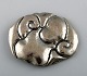 Danish Art 
Nouveau brooch 
in silver. 
Early 1900s.
Stamped.
Measures: 45 
mm.
In very good 
...