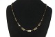 Unique 
Necklace, 8 
karat gold
Stamp: SKR
Goldsmith: 
Skrivers 
Guldvarefabrik
Length 46.5 
...