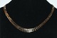 Geneva 
Necklace, 14 
karat gold
Stamped: 585. 
AH or HA
Length 41 cm.
Width 6.5 - 
9.5 ...
