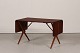 Danish Modern
Coffeetable 
made of teak 
and beech
Length 93/146 
cm
Width 52 cm
Height 55 ...