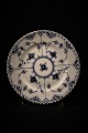 Royal 
Copenhagen Blue 
fluted full 
lace flat 
plate. 
Decoration 
number: 1/1087. 
dia.:17cm. ...