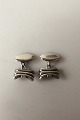 Evald Nielsen 
Silver 830S 
Cufflinks. 
Measures 1 x 
1.6 cm / 0 
25/64 x 0 5/8". 
Weighs 12g / 
0.40 oz.