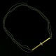 Ole Lynggaard. 
A three strand 
Hematite Pearl 
Necklace with 
14k Gold 
Diamond 
Pendant.
Designed ...