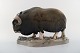Rare and early Royal Copenhagen Musk ox, porcelain figure, no. 530. 
Designed by Erik Nielsen in 1903.