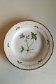 Royal 
Copenhagen 
Flora Danica 
Dinner Plate No 
735/3549. 
Latin name: 
Vinca minor L.
Measures ...