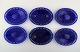 William Steberg 
for Gullaskuf. 
Six oval plates 
in dark blue 
art glass.
Measures: 22.5 
cm. x ...