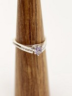 14 karat white gold ring with aquamarine and small diamonds sold