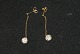 Earrings, 14 
karat
Stamped: 585
Length 45 mm.
Ball 6 mm.
Beautiful and 
well maintained 
...