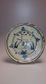 Pottery dish 
dated 
1858Diameter 
24.5cm.