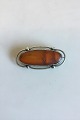 Broche Silver 
826S with 
Amber, Skagen, 
Christian 
Fjerdingstad. 
Measures 6 cm x 
3 cm / 2 23/64" 
x ...