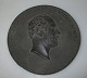 Wall 
application, 
pressed wood, 
with the 
Swedish king 
Carl XV in 
profile (1826 - 
1872), Sweden. 
...