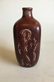 Royal 
Copenhagen 
Stoneware Vase 
with reliefs in 
Dark Red Glaze 
No 2369. 
Reliefs: Maria 
with Baby ...