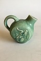 Saxbo Stoneware 
Vase/Pitcher 
with Green 
Glaze. Designed 
by Jais 
Nielsen. 
Measures 15 cm 
/ 5 29/32"