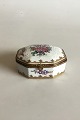 French Porcelain Box with gilted Bronze ornamentation. Approx. 1900