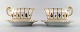 2 pcs. Royal Copenhagen Henriette, hand-painted porcelain with gold. old gravy 
boat on fixed stand, no. 444/8537.