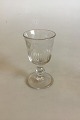 Vinglas with 
Bell-shaped 
Cuppa and Wine 
Leaves. 
Engraved MR. 
Measures 11.7 
cm / 4 39/64 
in. From ...