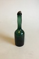 Olive Green 
Arrack Bottle 
From Kastrup 
Glassworks 
1853. Measures 
23 cm / 9 1/16 
in.