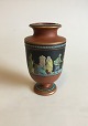 Early handpainted vase from Southern Europe.Measures 17cm and is in perfect condition.