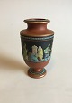 Early 
handpainted 
vase from 
Southern 
Europe.
Measures 17cm 
and is in 
perfect 
condition.