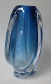 Vase, Val Saint 
Lambert, 
Belgium, 20th 
century. Blue 
and clear 
crystal. 
Signed. Height: 
21 cm.