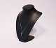 Necklase in 925 
sterling silver 
and pendant by 
Georg Jensen, 
#451 also of 
925 sterling.
Chain - ...