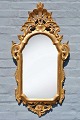 Italian carved 
gilded rococo 
style mirror, 
20th century 91 
x 45 cm.
Provenance: 
Artist Couple 
...