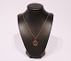 14 ct. gold 
necklace with 
pendant with 
motif of a 
Bull, stamped 
BHBH.
47 cm and 2 
cm.