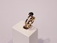 14 ct. gold 
ring with small 
diamonds and 
black ston.
Size 55.