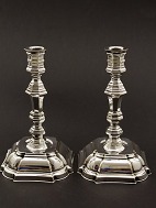 A pair of silver plated candlesticks