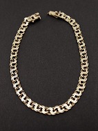 14 karat gold bismarck bracelet<BR>
sold