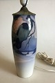 Rorstrand Art 
Nouveau Vase 
with Birds as a 
Lamp. Corrosion 
on metal. 
Measures 54 cm 
/ 21 17/64 in.