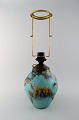 Art Deco table 
lamp, green 
patinated 
bronze with 
gold ...