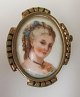 French 
porcelain 
brooch, 
Limoges, 19th 
century. 
France. Hand 
decorated with 
a young woman. 
With ...