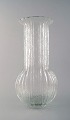 Very large Timo 
Sarpaneva for 
Iittala, art 
glass vase.
Signed: TS. 
1970 s.
Measures: 38 
cm. x ...