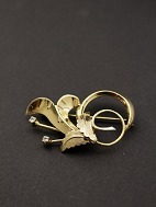 14 karat gold brooch  with 2 clear stone