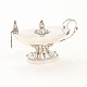 Georg Jensen: Olielampe af sølv. Perioden 1925-32. #12. H: 7,9cm. L: 14,5cm. V: 
167gr