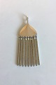 Georg Jensen 
Sterling Silver 
Broom Pendant 
No 142. 
Designed by 
Bent 
Gabrielsen. 
Measures 11 cm 
/ ...