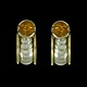 Georg Jensen. 
18k White & 
Yellow Gold Ear 
Clips with 
Citrine - On 
Track
Designed by 
Jan ...