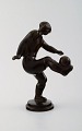 Sjælden Just Andersen. Figur af patineret diskometal i form af fodboldspiller 
nr. 1739.
