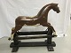 An old rocking horse on a stand
Decorative cuttings
Made of wood
L: 80cm H: 73cm
Please note: The tail is missing