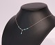 Necklace 
decorated with 
blue stones and 
of 925 sterling 
silver. 
44 cm and 
4,5x0,5 cm.