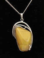 Silver chain with amber in silver mounting