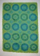 Rya tæppe i grønt og blåt design, "Flower power" svensk designer.
