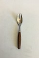 Fjord IHQ 
Quistgaard 
Steel and Teak 
Fork. Measures 
16.7 cm / 6 
37/64 in.